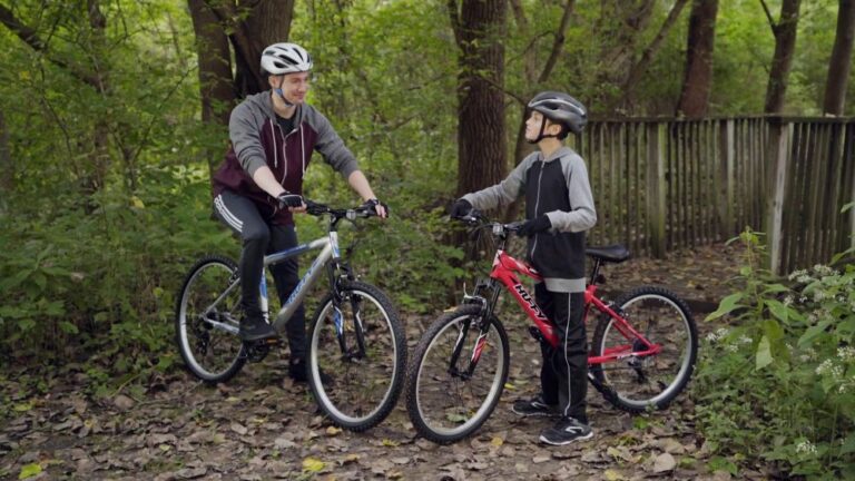 Father and Son riding Huffy Bikes