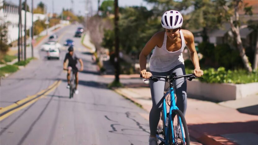 Female Driver Riding a Trek Dual Sport 4 Bicycle