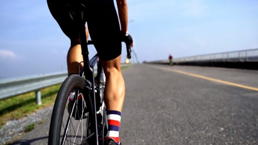 Man riding a bike on the road 