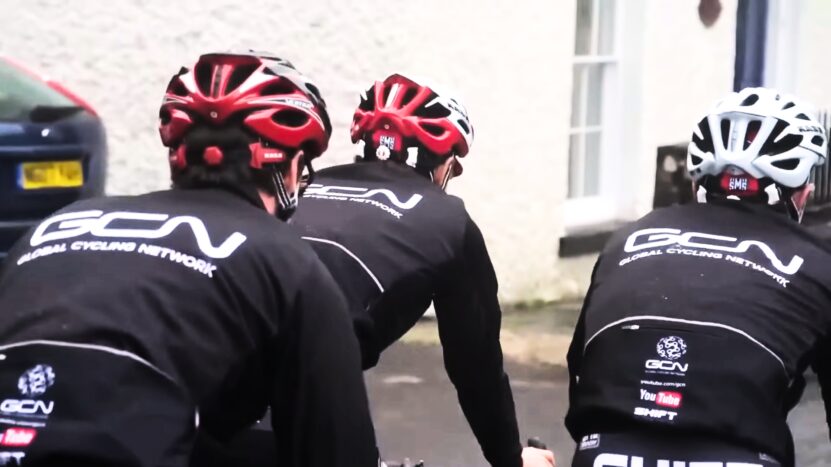 Cyclists from Global Cycling Network Wearing Helmets